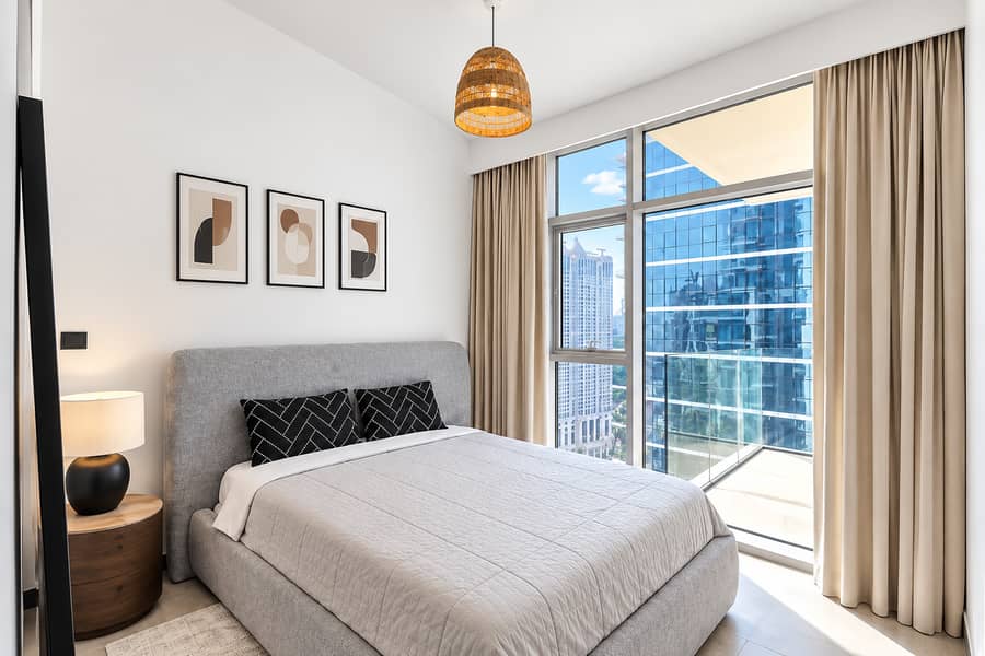 2 Sunlit Modern Bedroom with City Views (1). png
