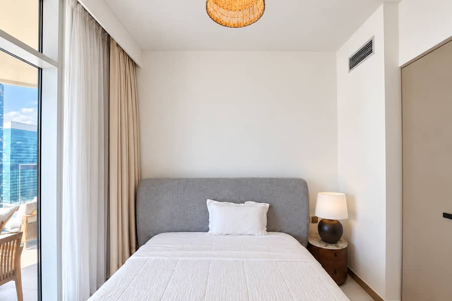 11 Minimalist Bedroom with City View (2) (1). png