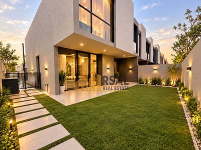 4 Bedroom Villa for Rent in Tilal City, Sharjah - Modern Townhouse Courtyard at Sunset. png