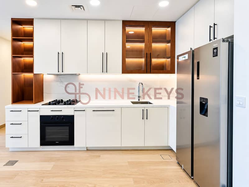 7 Bright Modern Kitchen with Warm Wood Accents. png