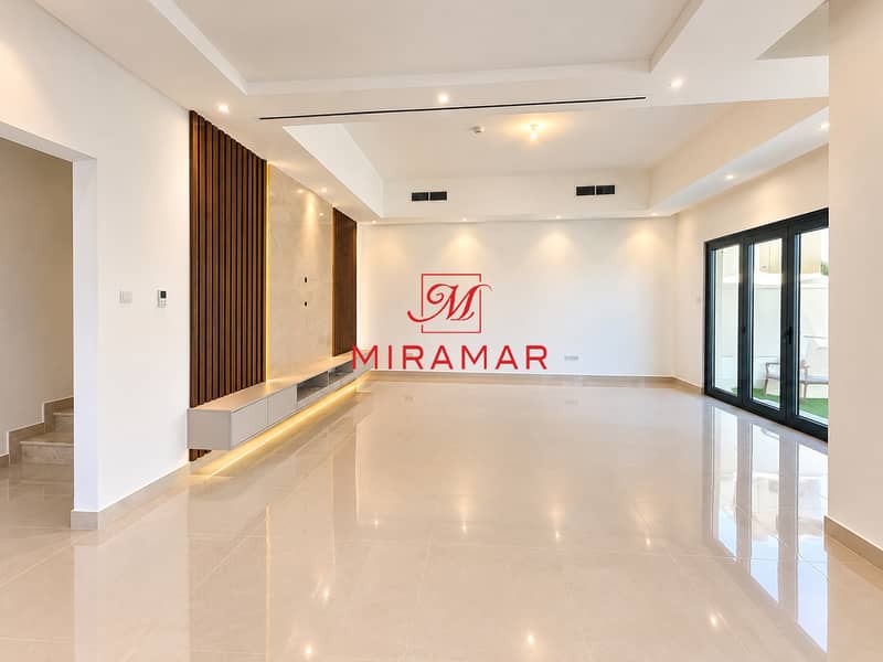 3 Minimalist Living Room with Marble Media Wall. png