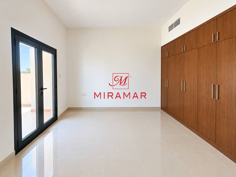6 Bright Minimalist Room with Built-In Wardrobes. png