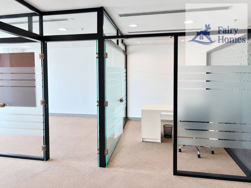 8 Bright Modern Office with Frosted Glass Partitions. png