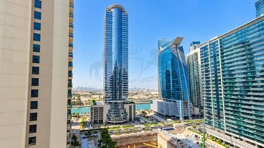 مکتب  للايجار في الخليج التجاري، دبي - Dubai Skyline and Canal Panorama. png