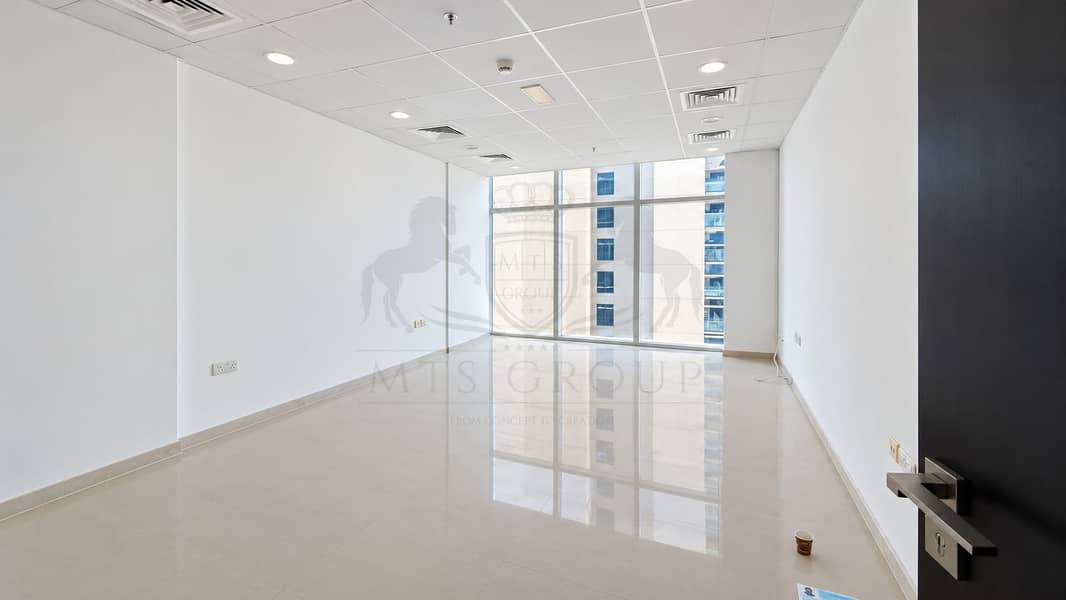 3 Empty Modern Office with Urban Window View. png