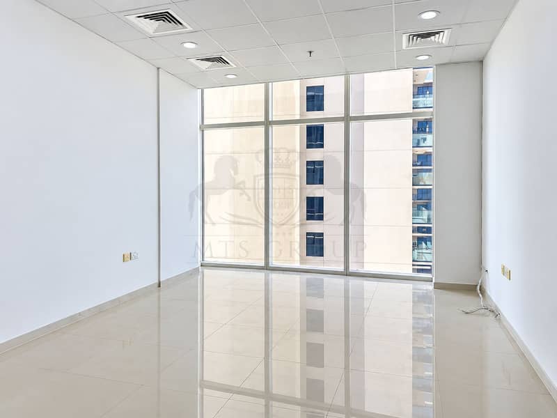 9 Minimalist Office with Reflective Windows. png