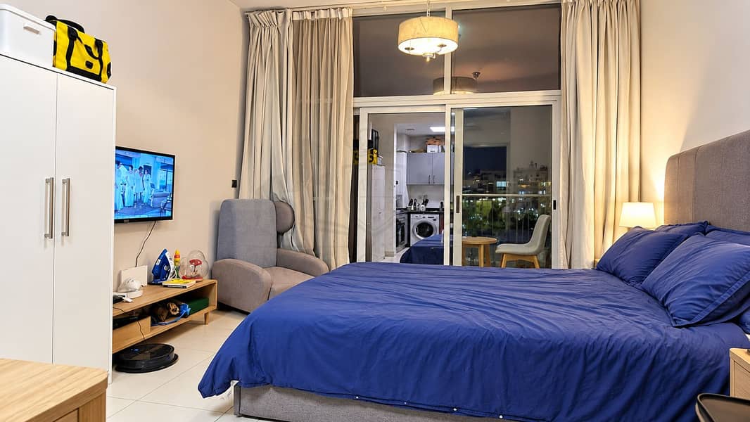 2 Cozy Modern Bedroom with City Views. png