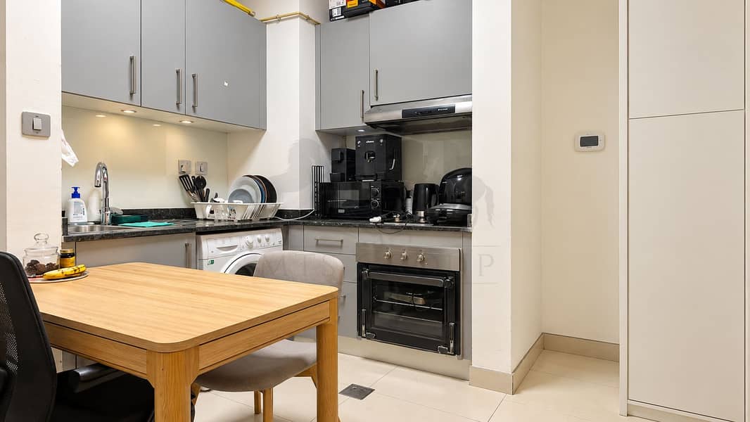 8 Modern Gray Kitchen and Dining Nook. png