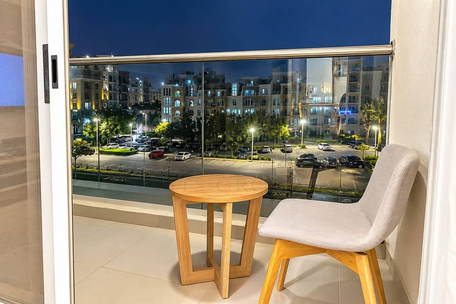 10 Cozy Modern Balcony Overlooking City Lights. png
