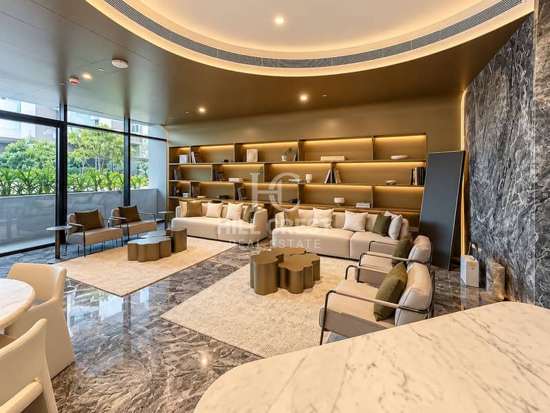 13 Warm Modern Lounge with Marble and Greenery. png