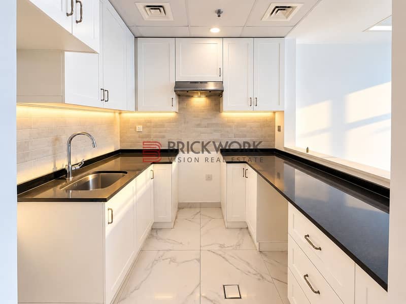 4 Bright Minimalist U-Shaped Kitchen. png