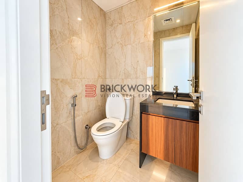 7 Modern Marble-Tiled Powder Room. png