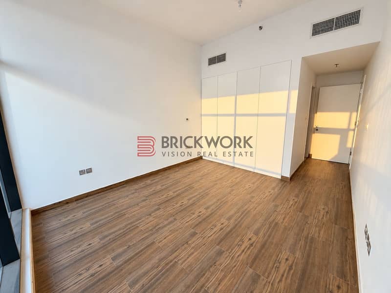 9 Sunlit Empty Modern Bedroom. png