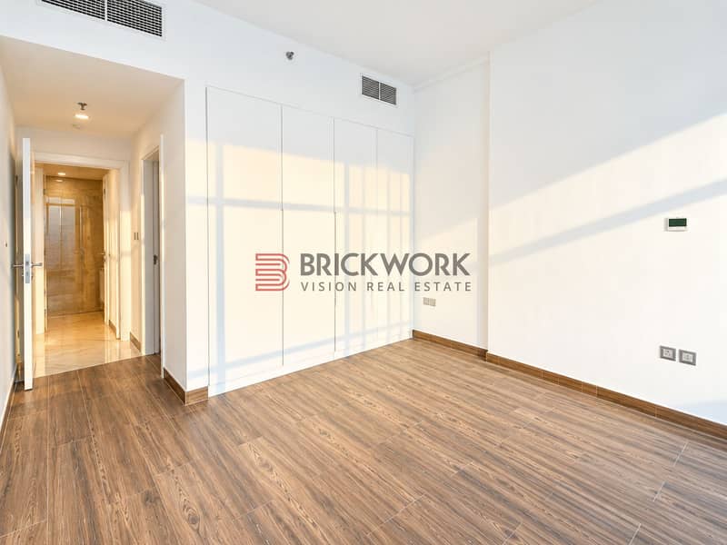 12 Sunlit Minimalist Bedroom with Built-In Wardrobe. png