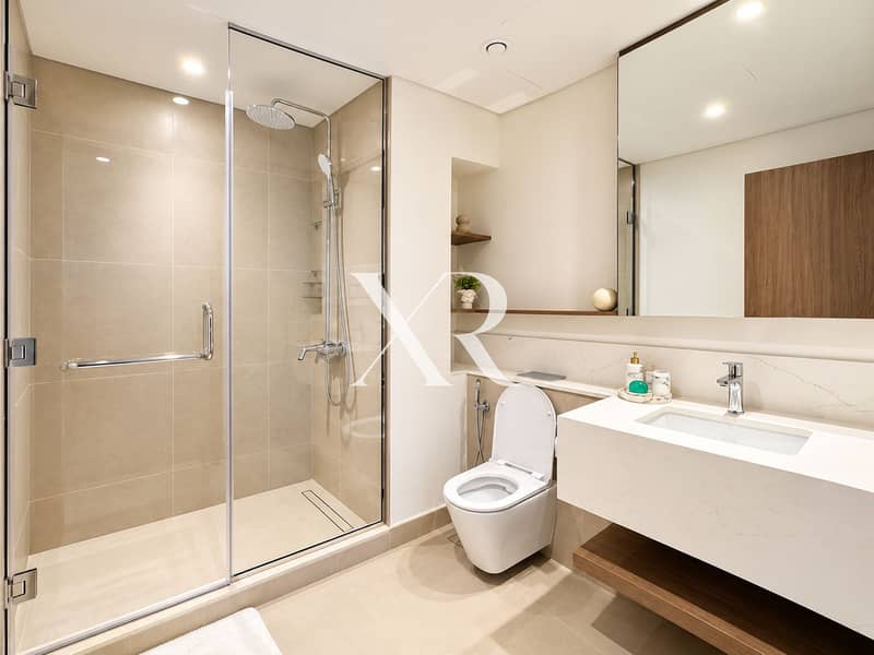 17 Modern Spa-Like Bathroom with Glass Shower. png