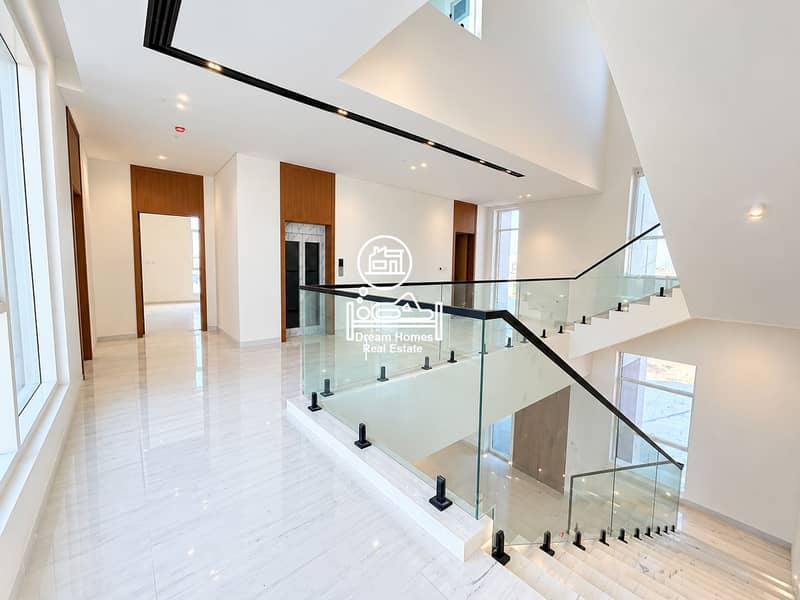 14 Modern Marble Mezzanine with Glass Staircase. png