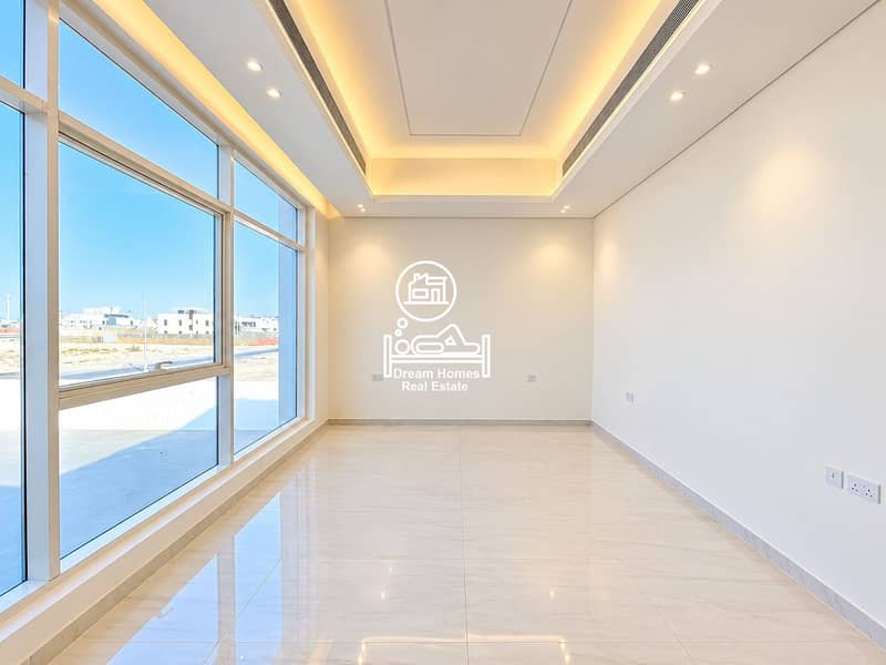 22 Sunlit Modern Room with Tray Ceiling. png
