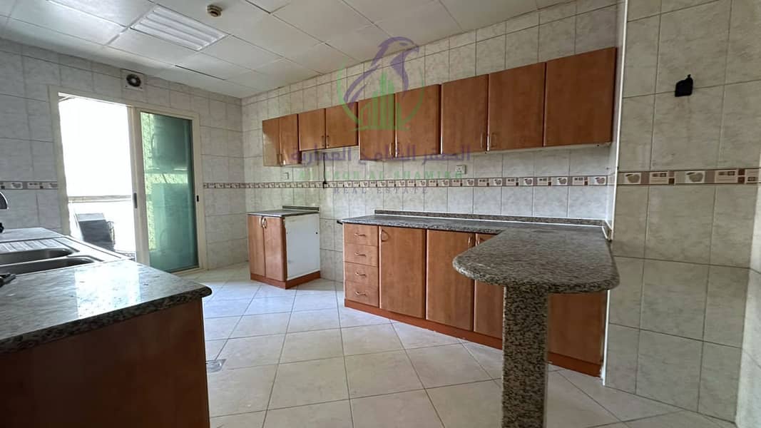 13 apartment-for-rent-3-bedroom-altaawn-alsharqh-kitchen-16. jpg
