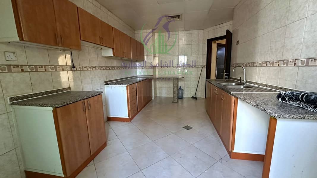 14 apartment-for-rent-3-bedroom-altaawn-alsharqh-kitchen-19. jpg
