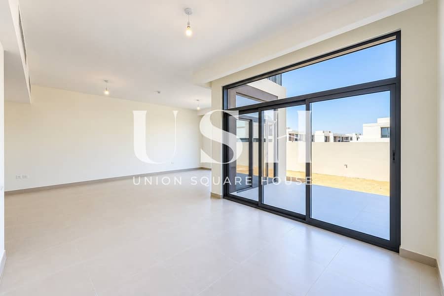 7 Sunlit Modern Living Space with Patio. jpg
