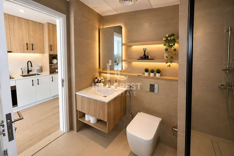 8 Warm Minimalist Bathroom with Kitchen View. png