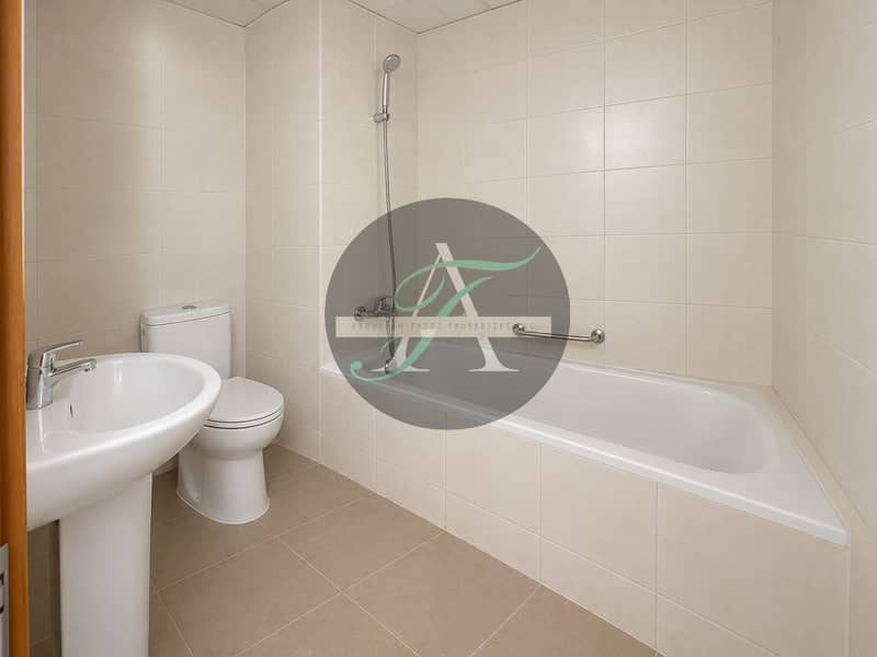 6 Modern Minimalist Tiled Bathroom. png