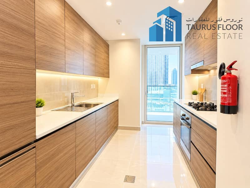 3 Warm Modern Galley Kitchen with City Views. png