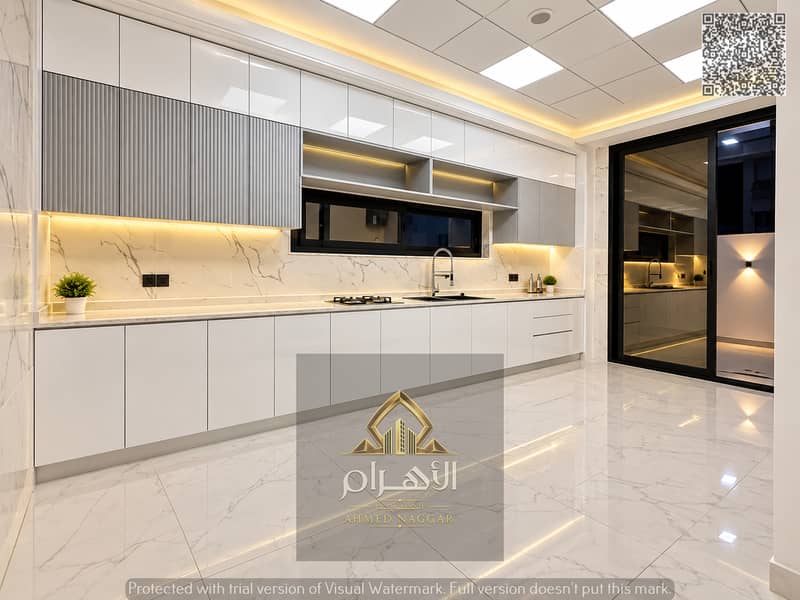 5 مطبخ عصري فاخر بإضاءة دافئة. jpg