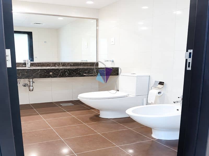 16 Pristine Modern Marble Bathroom. png