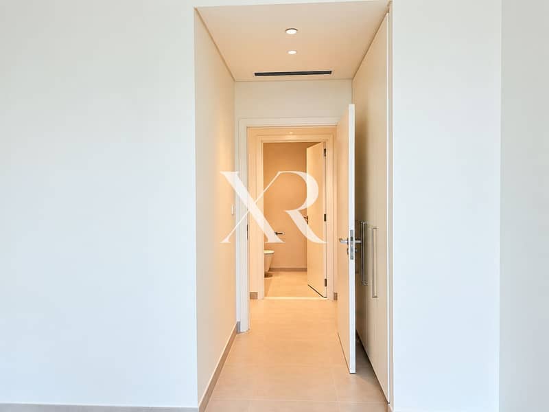 6 Minimalist Warm-Toned Hallway. png