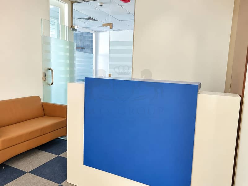 11 Modern Blue Reception with Tan Sofa. png