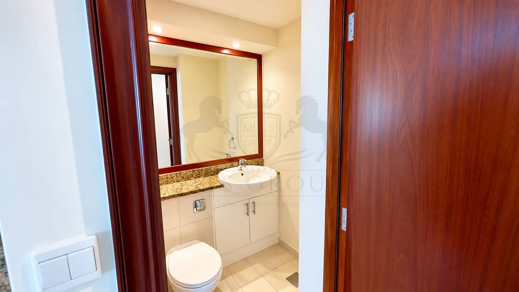 28 Modern Bathroom Through Open Doorway. png