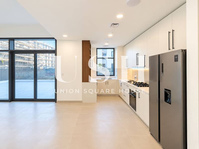 3 Modern Open-Plan Kitchen with Terrace Views. png