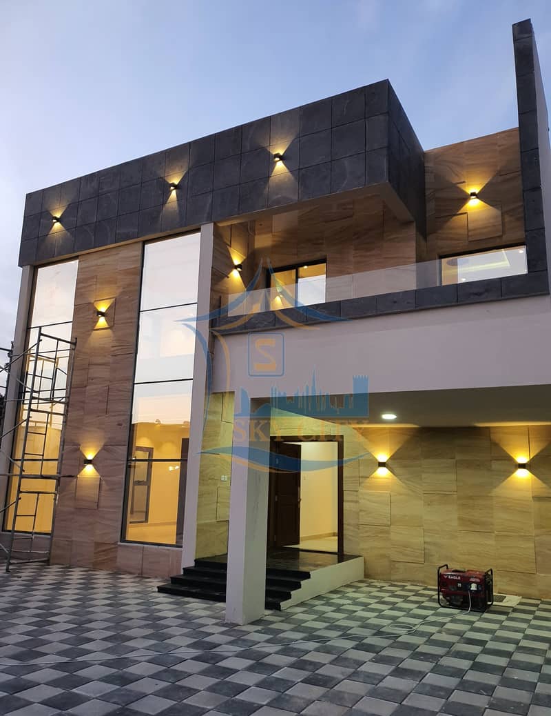 Modern villa for sale Super deluxe finishing, opposite Ajman Academy, Markaz Mall, Carrefour Hill
