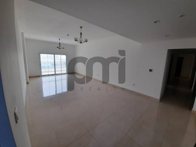 Three-Bedroom Apartment with Balcony Three-Bedroom Apartment with Balcony