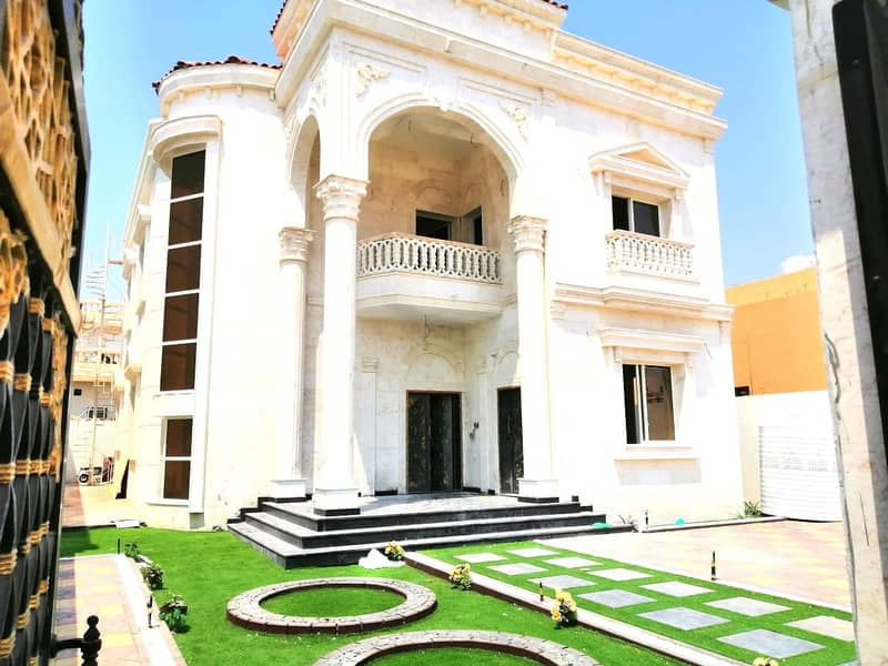 Luxurious Villa  Classic Design in  Perfect location . New villa with an area of ​​5000 in Ajman Al Rawda 2  for sale
