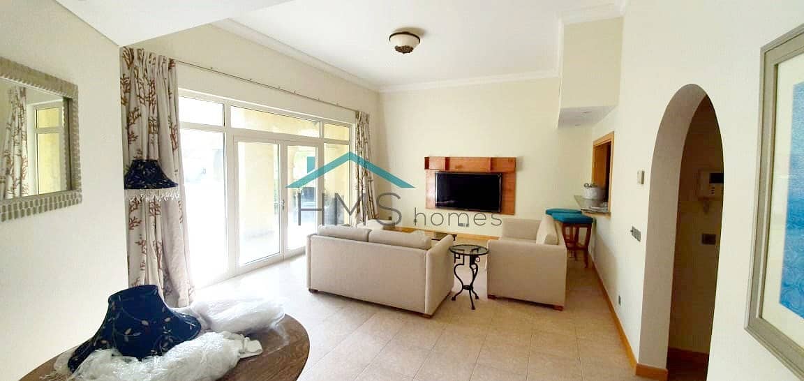 Furnished Ground Floor unit with high ceilings