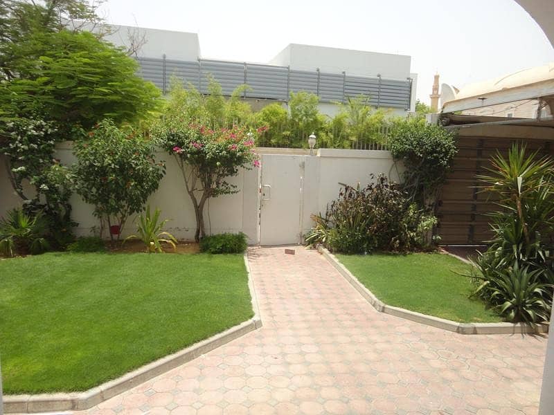 Spacious 4 bedroom plus study villa with pvt garden and shared pool in Umm Suqeim 2