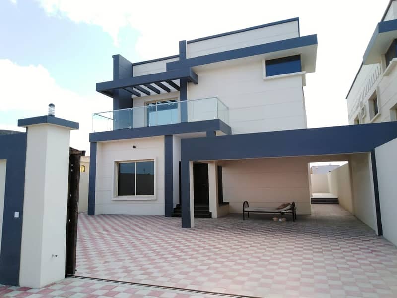 The second piece of villa from the neighbor street and modern design for sale in Ajman