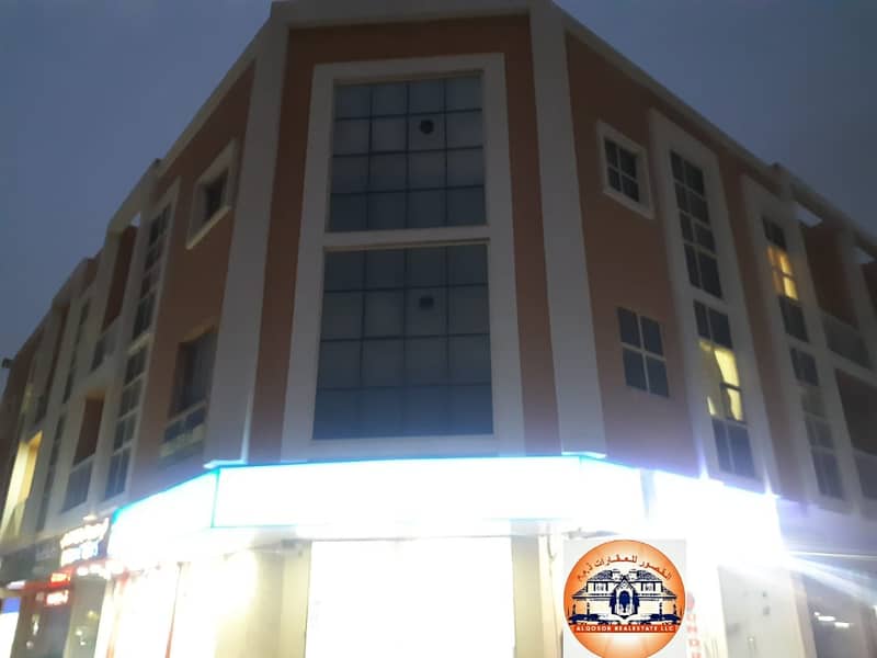 Building for sale, fully leased, in a lively area in Ajman, at an opportunity price
