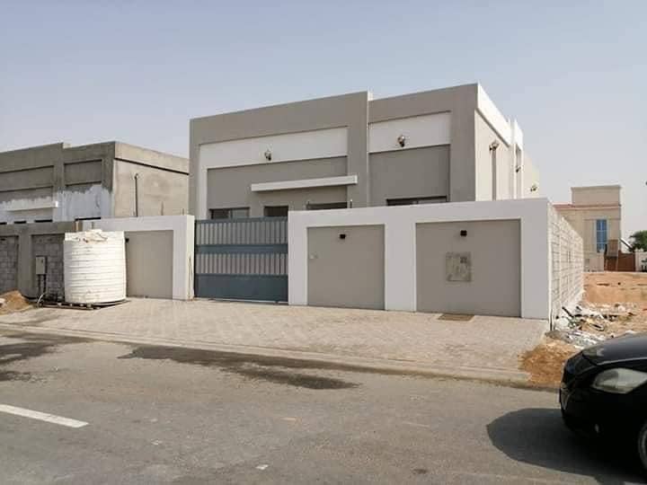 Villa for sale next to the mosque and a stone face close to Sheikh Mohammed bin Zayed Street