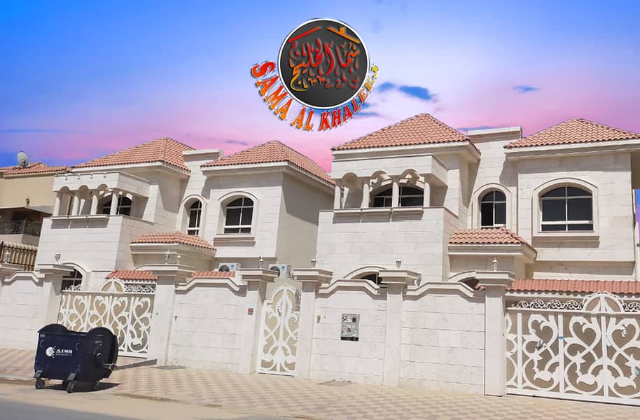 Bright new villa with a stone facade and modern design for sale in Ajman