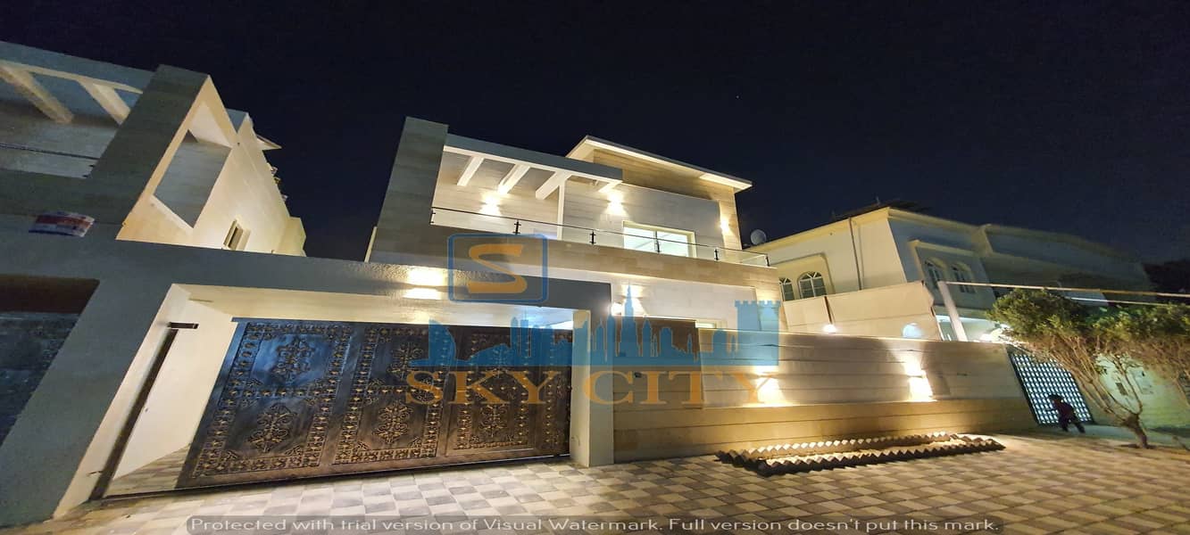 Modern villa, personal finishing, corner of two streets, at a price of less than two minutes, on Sheikh Mohammed bin Zayed Street