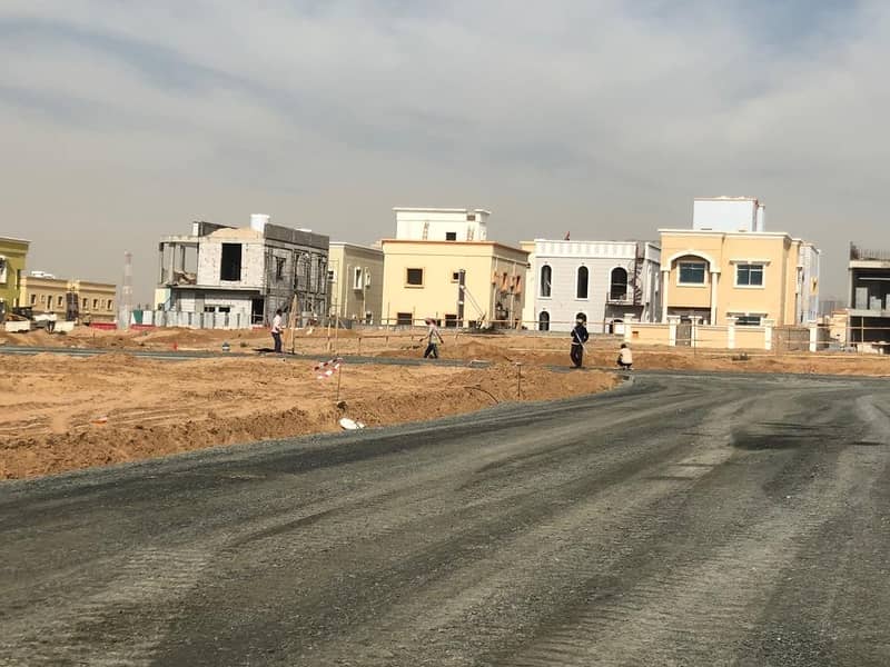 Residential lands for sale , BEST LOCATION between Sharjah and Ajman directly on Al  Zubair  Street,  NO  FEES , next to all services