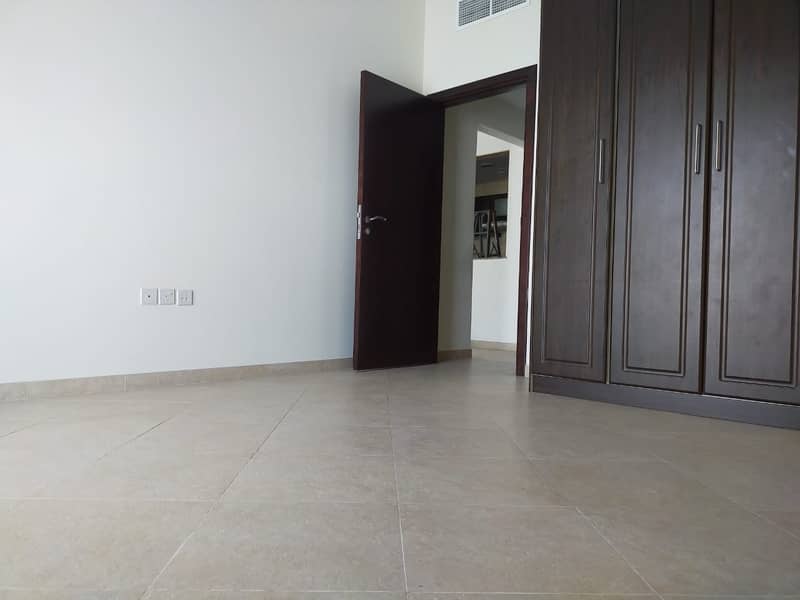 SPACIOUS 1BHK JUST 38K WITH ONE MONTH FREE GYM POOL COVERED PARKING