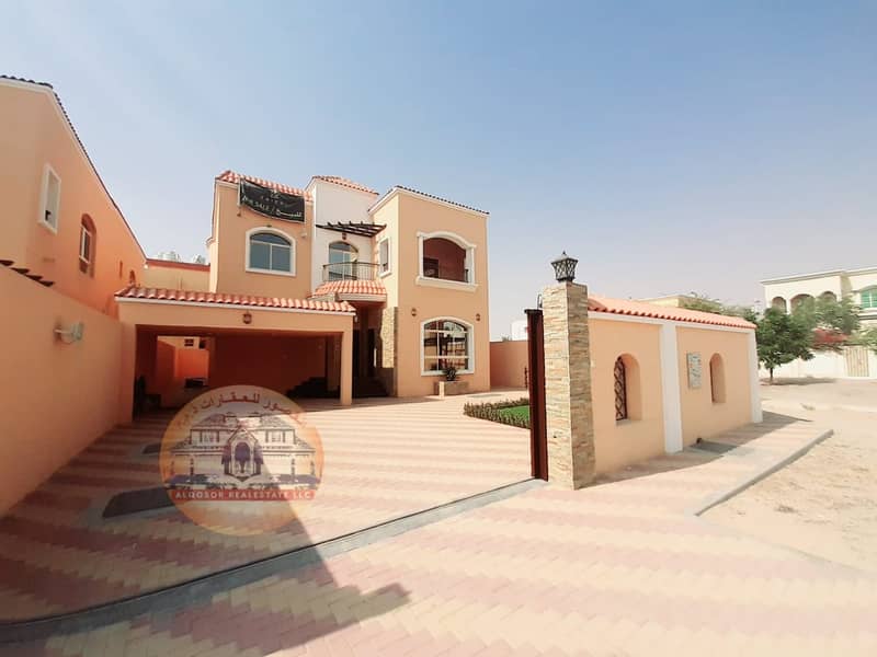 Villa for sale in Ajman, Al Rawda area, modern design, super deluxe finishing with the possibility of bank financing