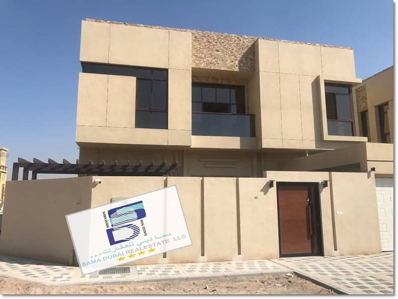 Central air-conditioning villa, unique and wonderful design, suitable space and close to all services, the finest areas of Ajman (Al-Muwaihat), freehold for all nationalities