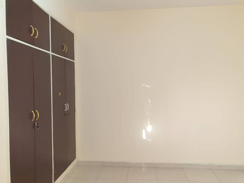 Direct From Owner( AL HASAWI BUILDING ) . Chiller Free .  Sea view No commission. 2 B/R   Spacious Big Apartments. Partial View Sheikh Humaid bin Rashid Street