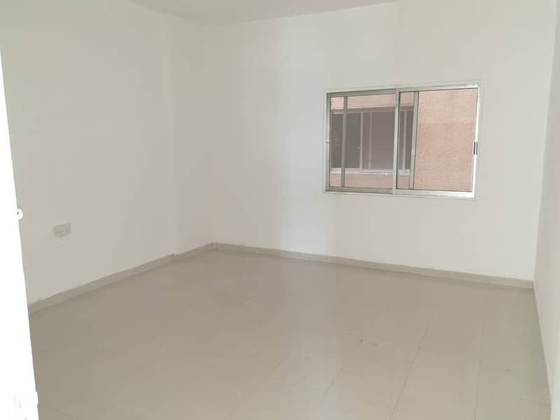 Direct From Owner( AL HASAWI BUILDING ) . Chiller Free .  Sea view No commission. 2 B/R   Spacious Big Apartments. Partial View Sheikh Humid bin Rashid Street