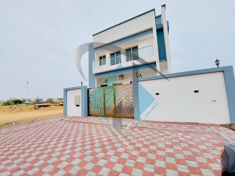 For sale villa in Ajman central adaptation on a running street without down payment and monthly installments for 25 years with a large banking lending